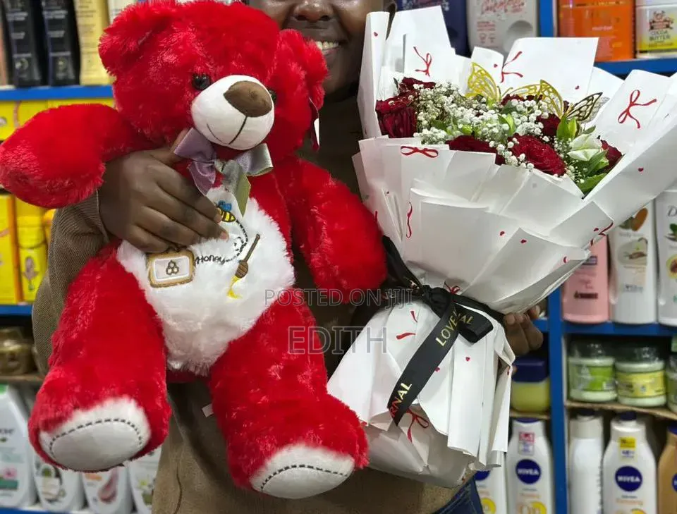 A Teddy Bear And Flower Combo