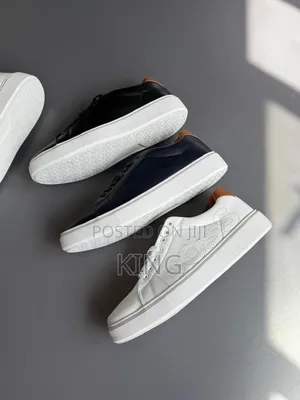 White, Navy, and Black Leather Boss Trainers