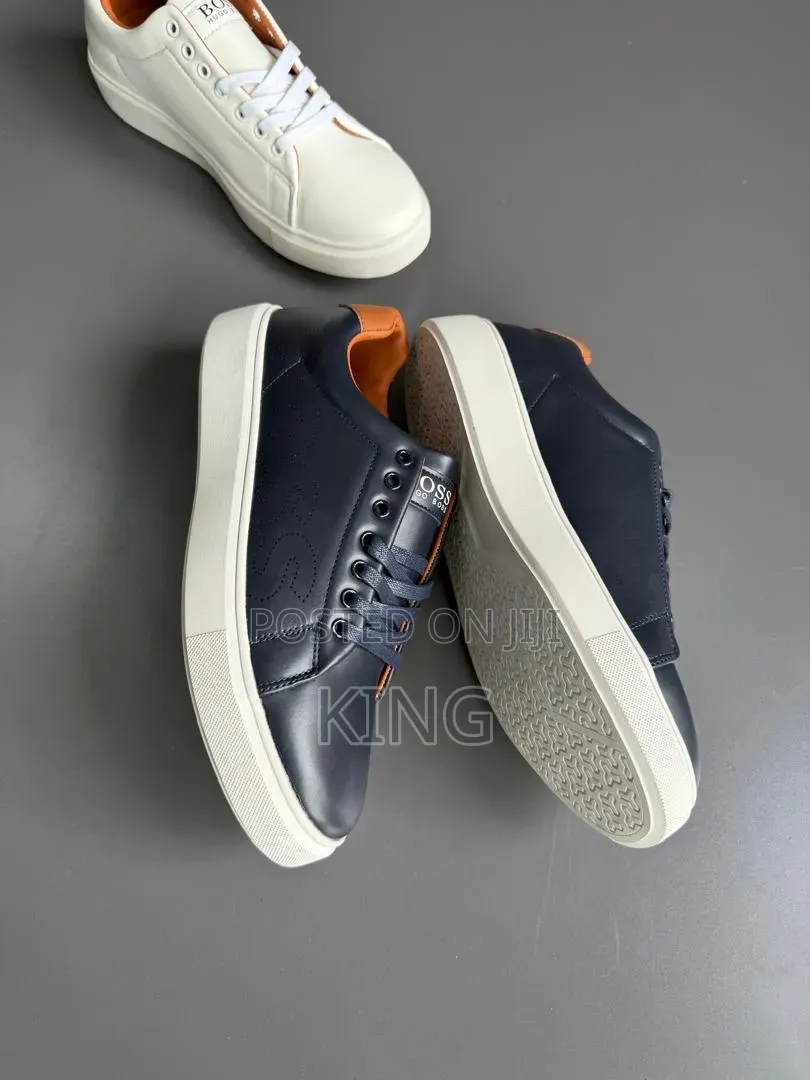 White, Navy, and Black Leather Boss Trainers