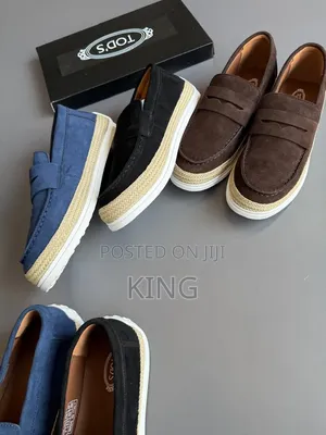 Tod's Suede Loafer Sneakers Featuring Raffia Piping.