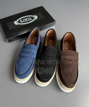 Tod's Suede Loafer Sneakers Featuring Raffia Piping.
