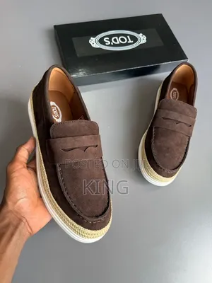 Tod's Suede Loafer Sneakers Featuring Raffia Piping.