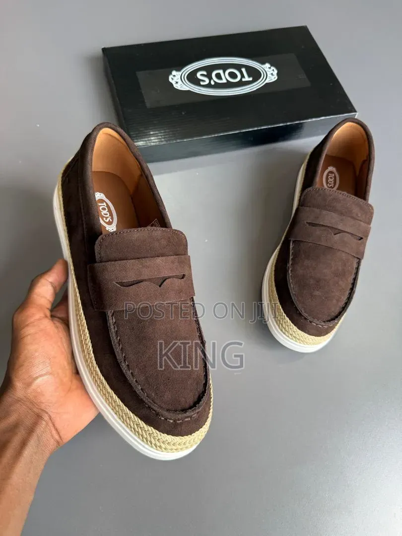 Tod's Suede Loafer Sneakers Featuring Raffia Piping.