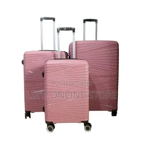 Pink Rubber Luggage Set Features a Distinctive Wavy Hard-Shell Texture