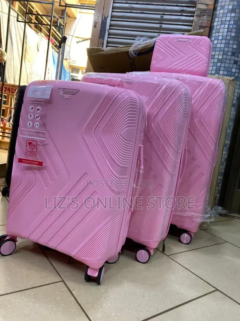 Pink Hardshell Luggage Set With Different Designs