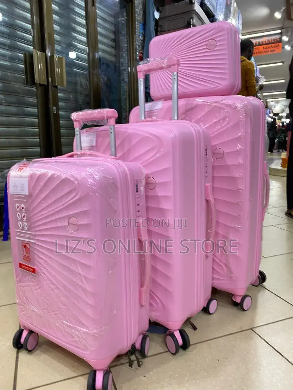 Pink Hardshell Luggage Set With Different Designs