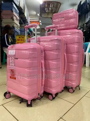 Pink Hardshell Luggage Set With Different Designs