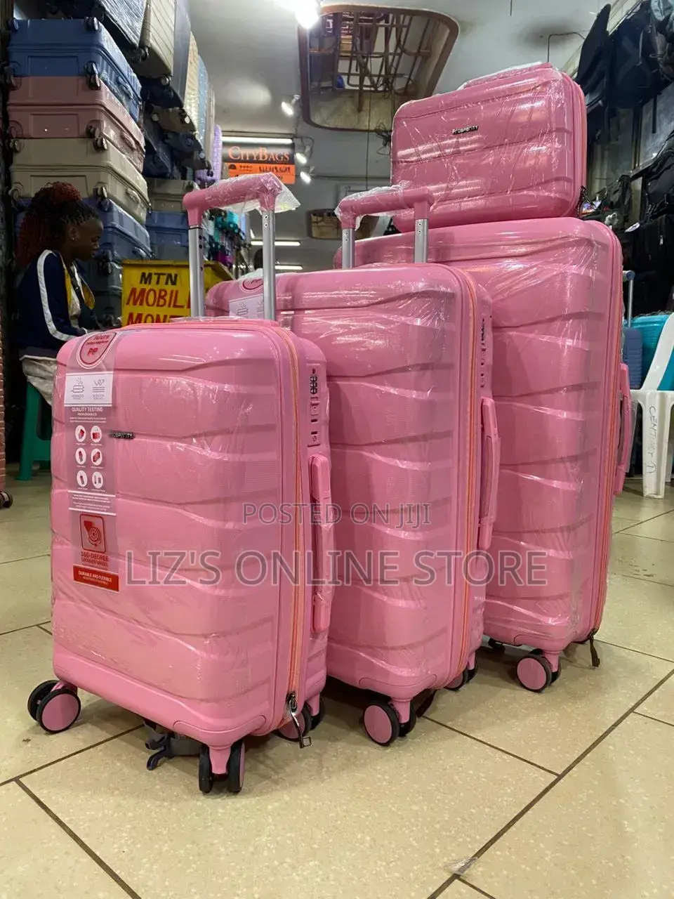 Pink Hardshell Luggage Set With Different Designs