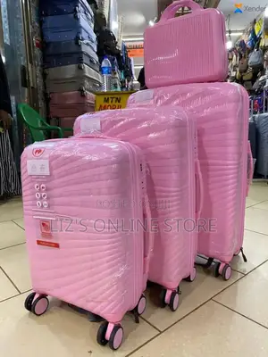 Pink Hardshell Luggage Set With Different Designs