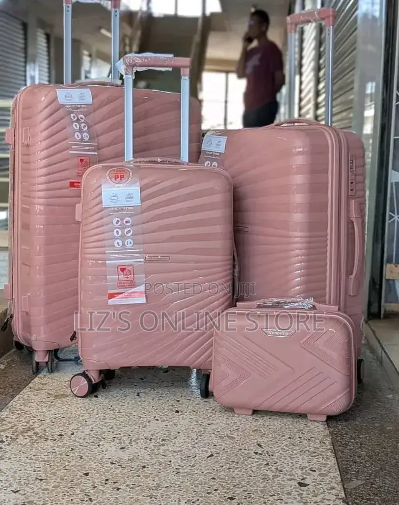 Pink Hardshell Luggage Set With Different Designs