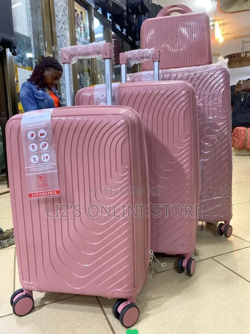 Pink Hardshell Luggage Set With Different Designs