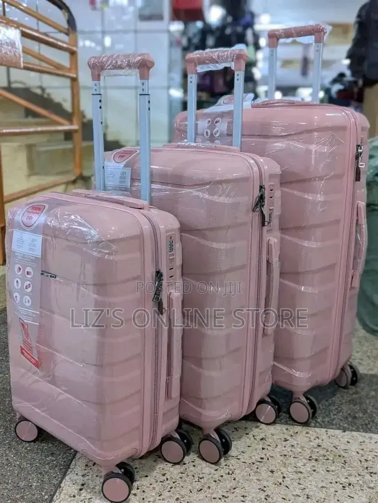 Pink Hardshell Luggage Set With Different Designs