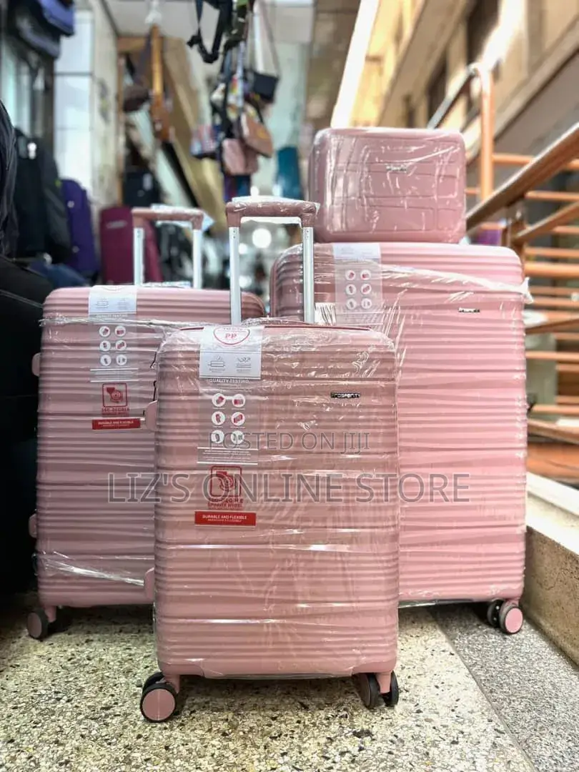 Pink Hardshell Luggage Set With Different Designs