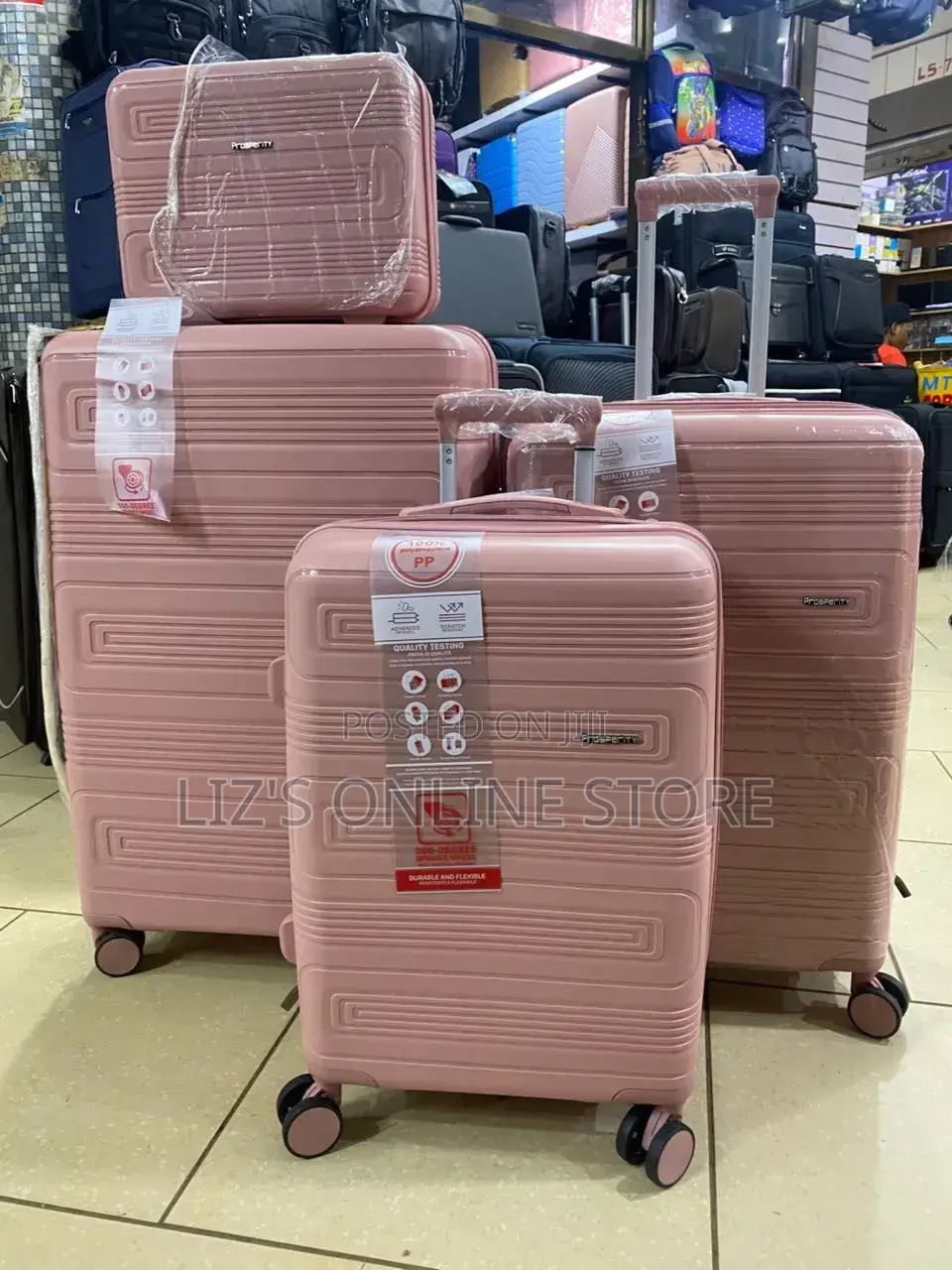 Pink Hardshell Luggage Set With Different Designs
