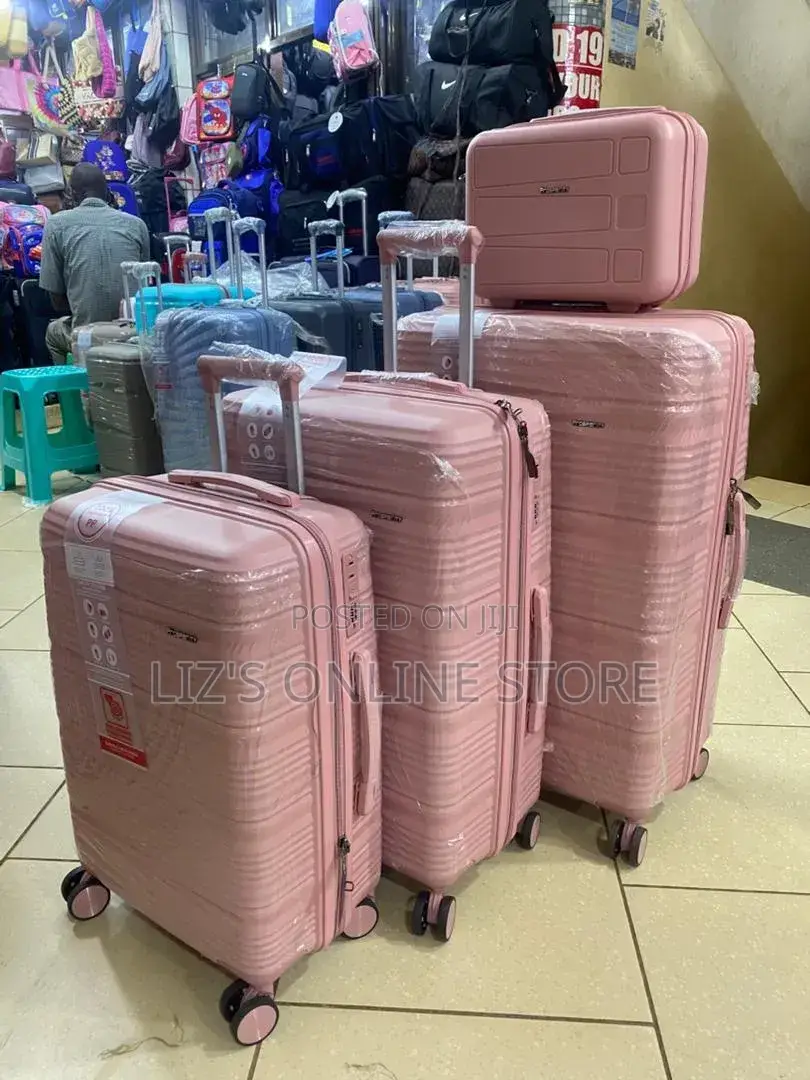 Pink Hardshell Luggage Set With Different Designs