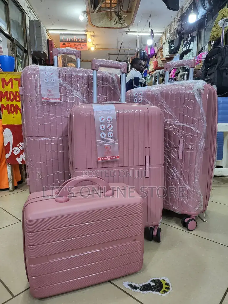 Pink Hardshell Luggage Set With Different Designs