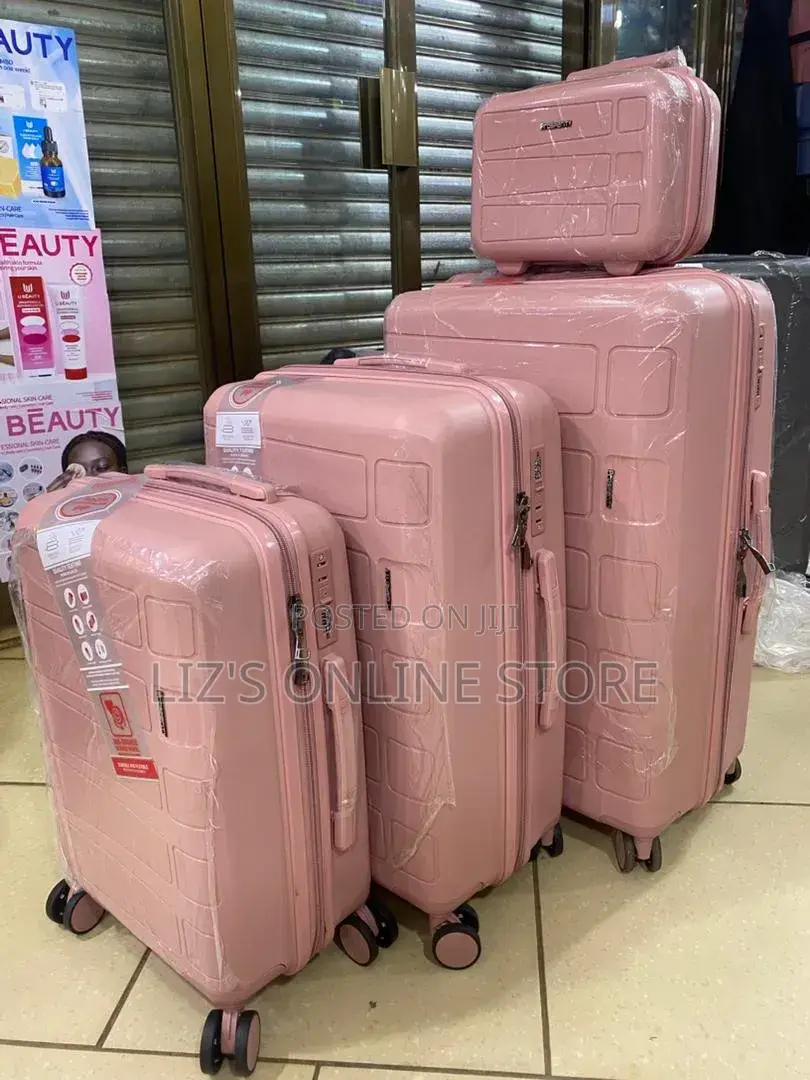 Pink Hardshell Luggage Set With Different Designs