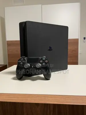 Sony Playstation 4 Slim Standard With Controllers and Games