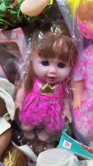 My Cute Baby" Doll Wearing a Bright Pink Dress Adorned