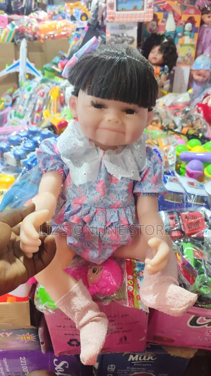 Realistic Reborn Toddler Doll Features Dark Hair