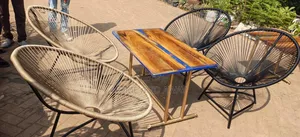 A Set Of 4 Seaters Garden Chairs With Epoxy Center Table 1,600,000/-