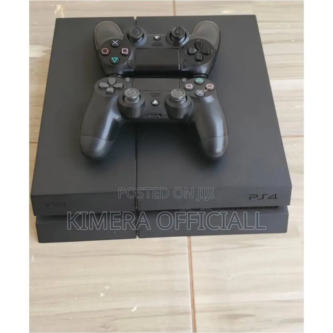 Sony Ps4 Standard Deal With 2 Controllers and Game Library
