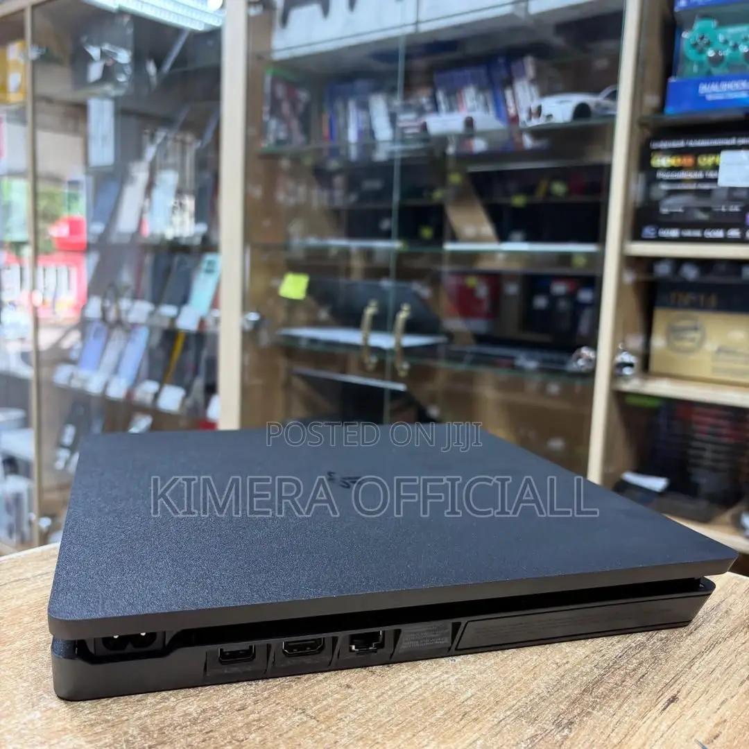 Playstation 4 Slim Ready Bundle With 2 Pads and Game Collection