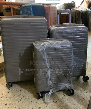 Set of 3pcs Rubber Waterproof Suitcases (S,M,L) - Multicolor Designs