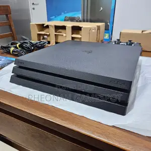 Buy Ps4 Pro Chipped With Two Pads and Over 12 Amazing Games