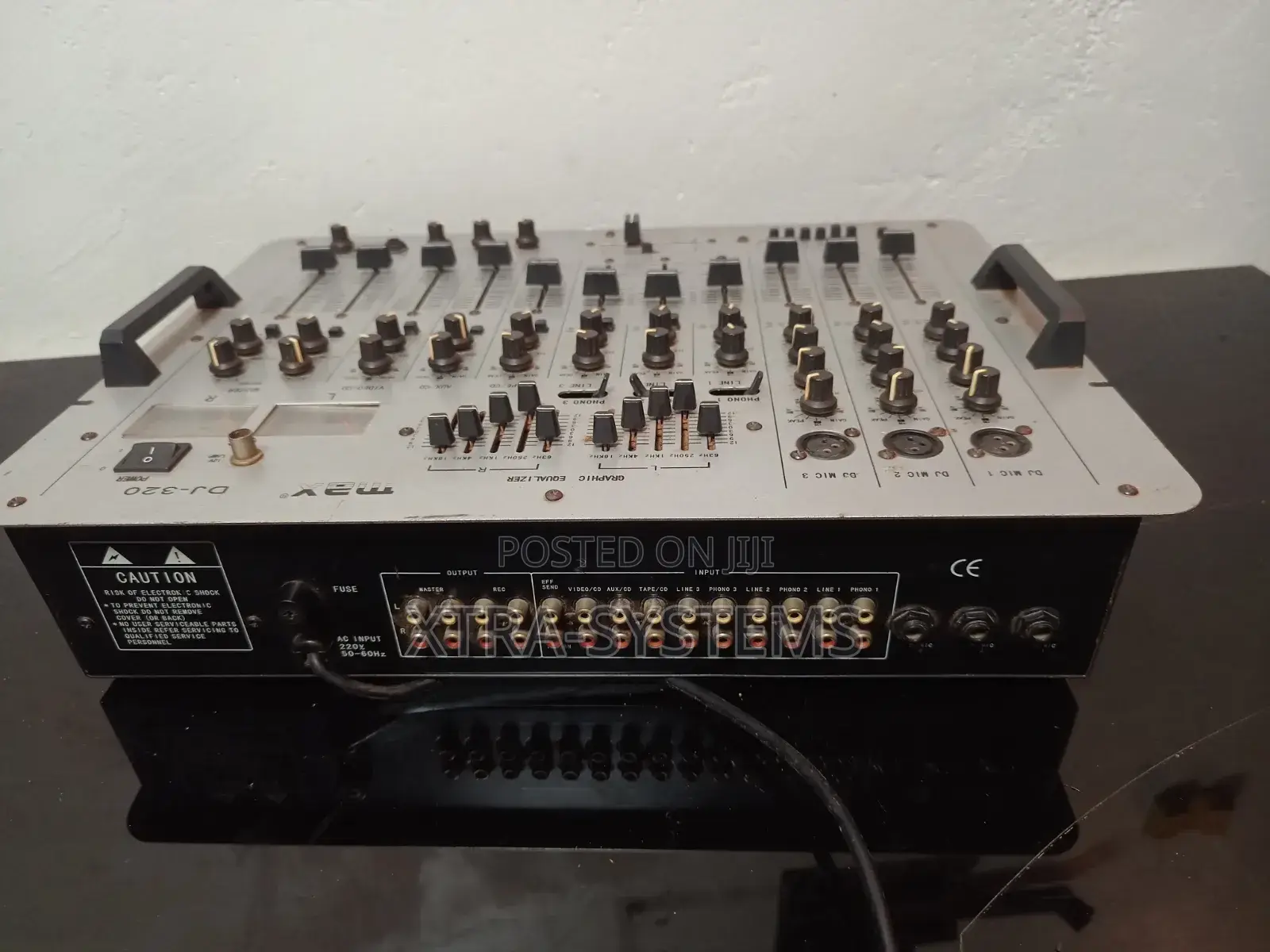 Dj Mixer With Multiple Channels and Controls.