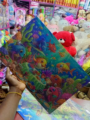 Jigsaw Puzzle Featuring a Colorful Underwater Scene With Cartoon Fish.
