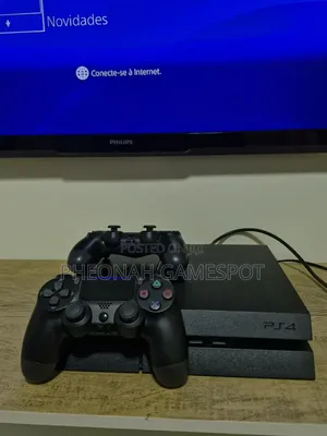 Chipped Playstation 4 Package With Two Controllers.