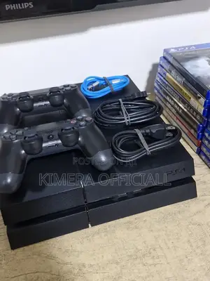 Playstation 4 Chipped System With Controllers And Games.