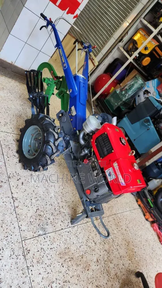 Walking Farm Tractor With Water Cooled Engine and Ox Plough