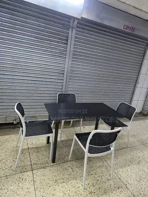 Wooden Folding Table and Plastic Chairs