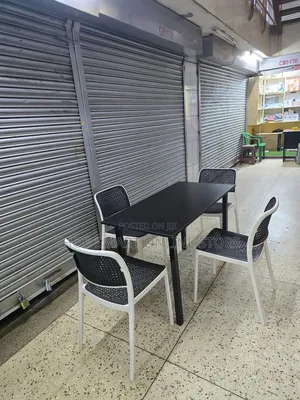 Wooden Folding Table and Plastic Chairs