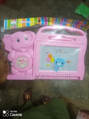 Fun Gamewitha Cute Elephant Design With an Integrated Learning Clock.]
