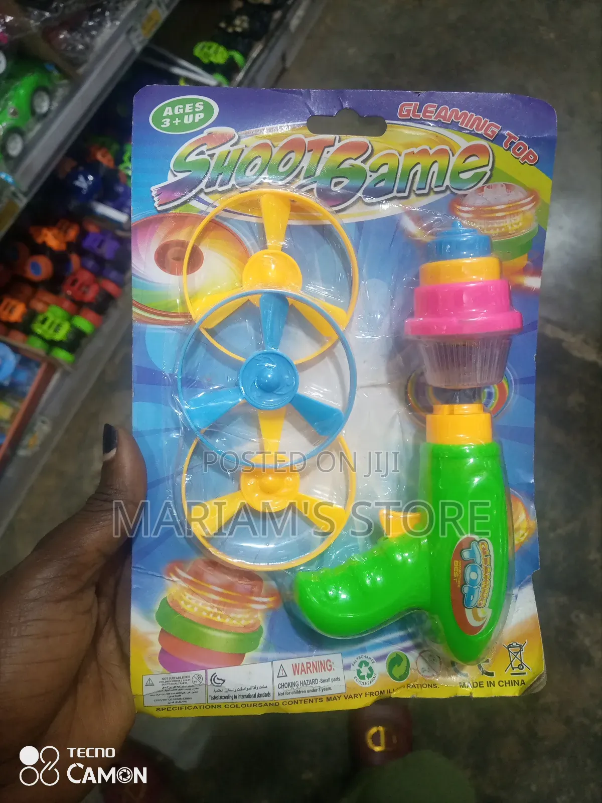 Shoot Game Toy Set a Bright Green Launching and Spinning Tops.