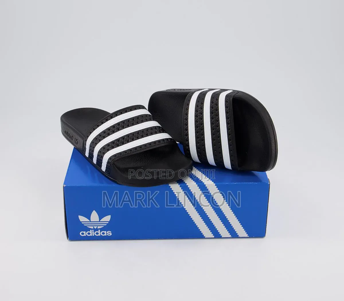 Black and White Adidas Adilette Slides