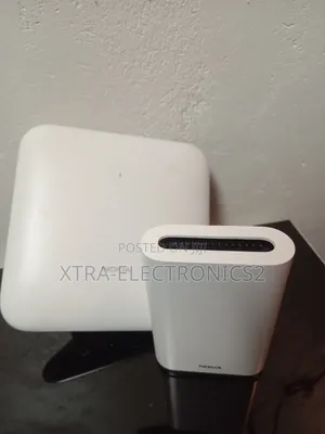 Fastmile 5g Outdoor Receiver + Nokia Wifi Beacon Mesh Router Kit.