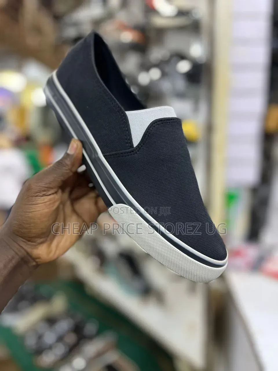 These Men's Slip-on Shoes Feature a Black Canvas Upper With White