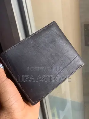 Tommy Hilfiger Men's Leather Bifold Wallet