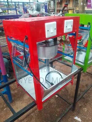 First Electric Popcorn Machine