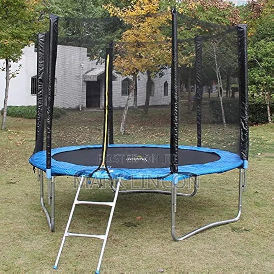 8ft Round Trampoline Features a Blue Safety Pad and a Safety Net .