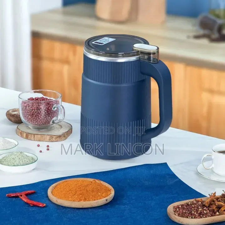 Portable, Mug-Shaped Electric Coffee Grinder.