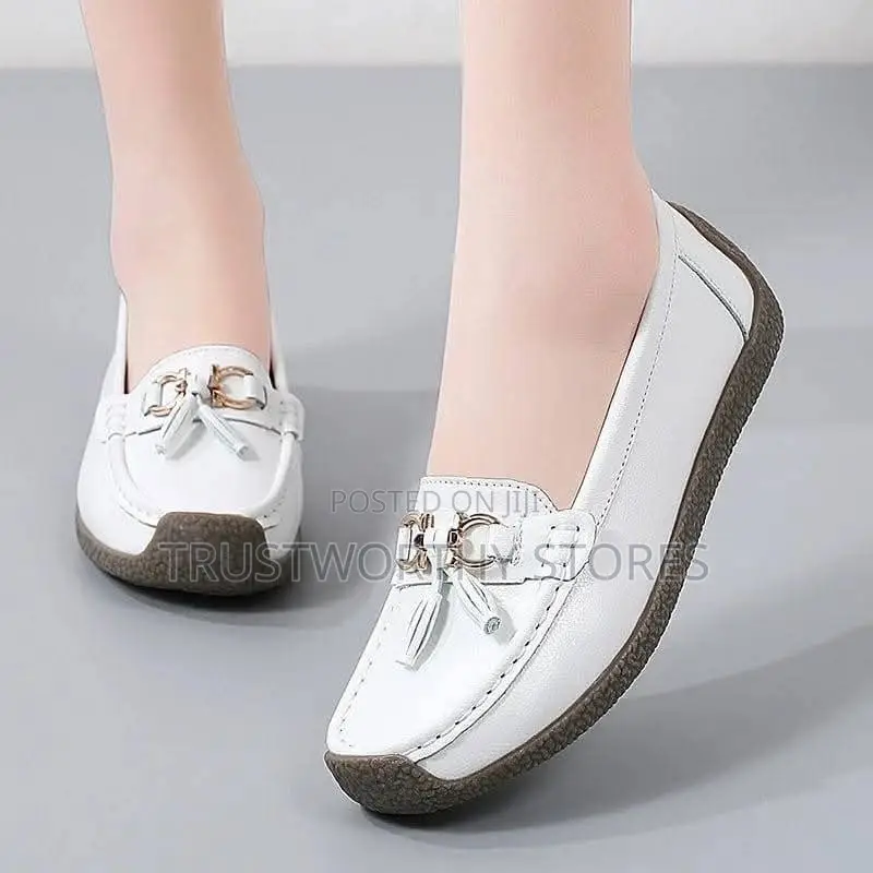 White Lady’S Moccasin Shoe
