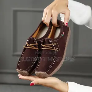 Boat-Shoe-Inspired Moccasins. Brown in Color