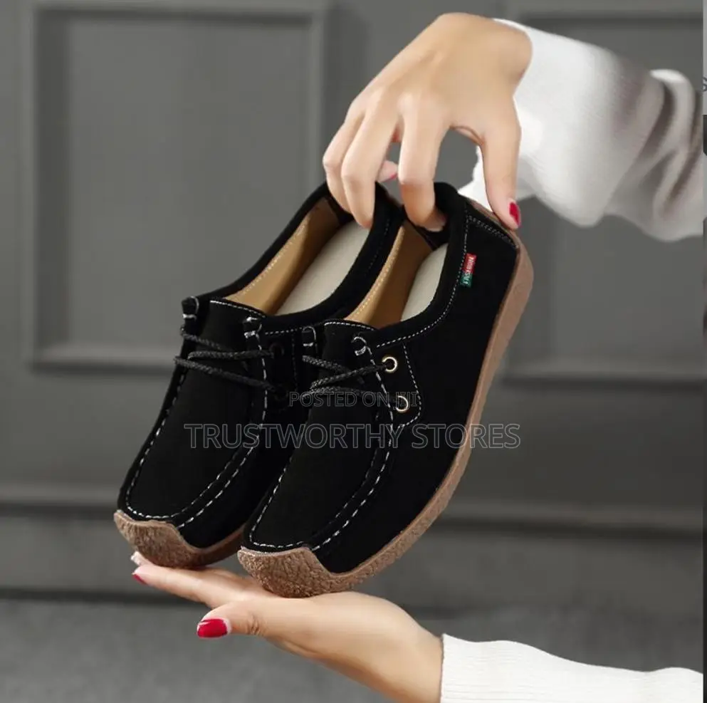 Unique Black Boat-Shoe-Inspired Moccasins.
