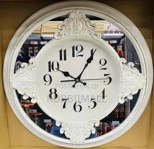 Baroque-Style Mirrored Wall Clock