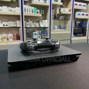 Playstation Four (Ps4) Slim With Games Installed